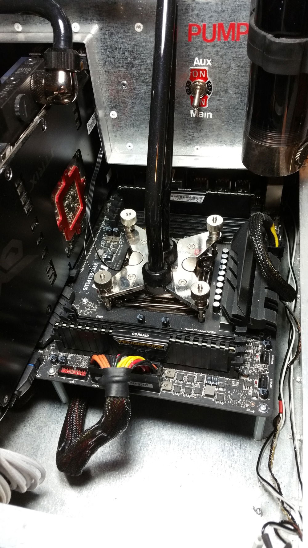 CPU Upgrade to the i7 5960, Corsair 32GB RAM, and 950 Pro NVME drive. Note the pump switch, so I can purge, drain, or fill the loop without powering on the system.