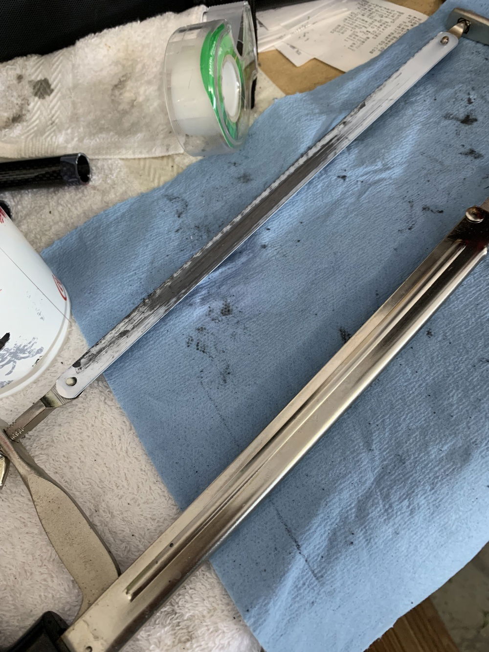 I used a standard hacksaw with a 32 tooth per inch blade...The blade needs to be very fine...