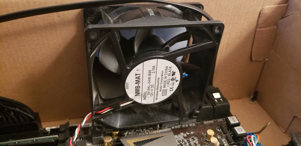 Dell fan from inside, is an intake and rely on the holes and CPU fan for cooling, stays at 50°C under load