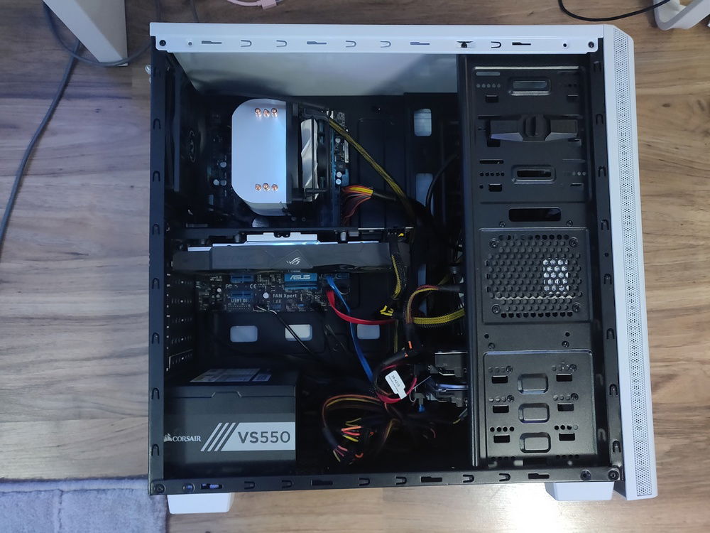 Components with side panel off. The cheap chassis doesn't really give options for cable management.