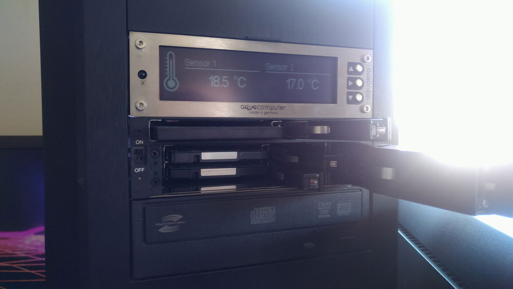 aquaero because yes :D 

and all the drives are removeable. Harddrives run in raid 0