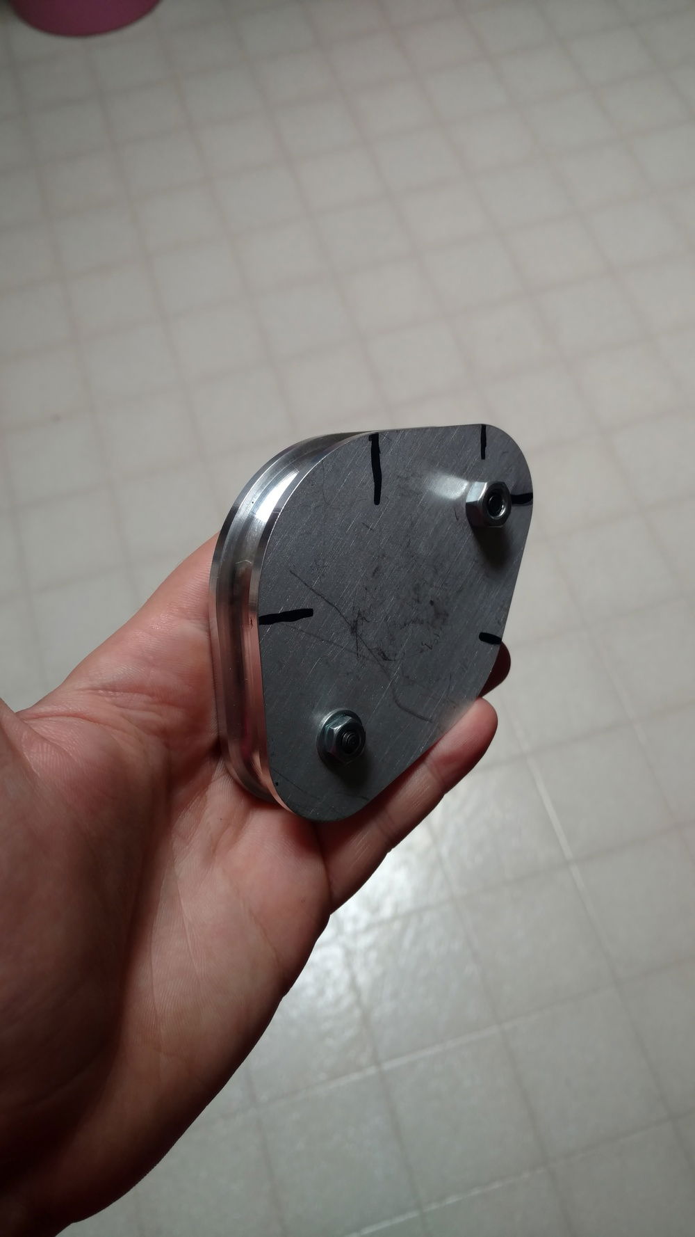 My father is a tool and die maker, and rather than buying a tool to bend tubing he made one for me. Has a 90, 45, and 135 angle and was free.