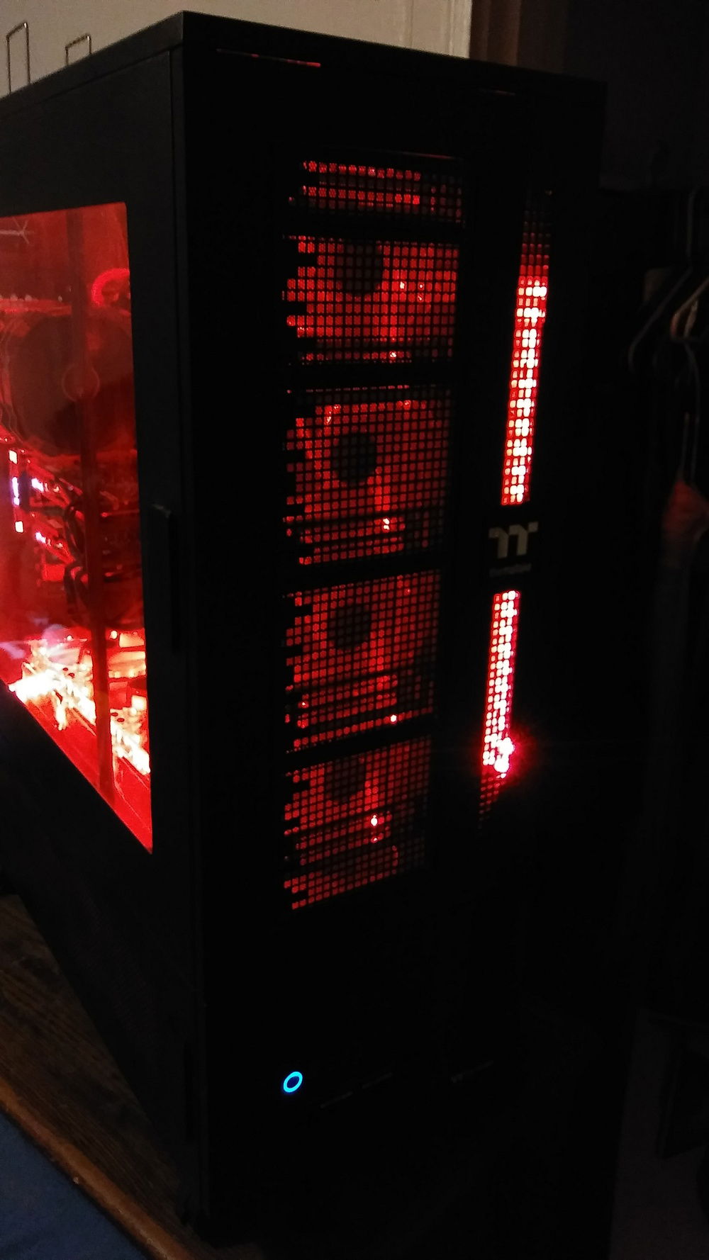 From the front....I changed the default blue LED strip in favor of an RGB one, that is of course red, to match the rest of the lights...I couldn't change the blue LED ring on the power switch though, but as you can see, the cables were long enough to move it from the default position at the top of the W100....