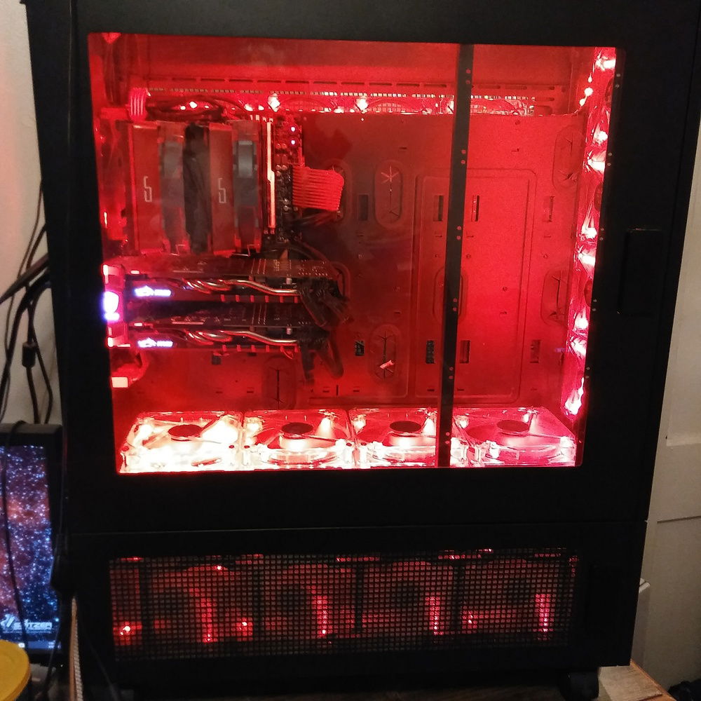 An almost full length pic....I had trouble finding a good balance between getting the whole thing in a shot, and making it close enough to be able to see what's in there lol.....It's amazing how small a full ATX board looks in there, kind of like an ITX board in any "normal" mid sized tower lol.....