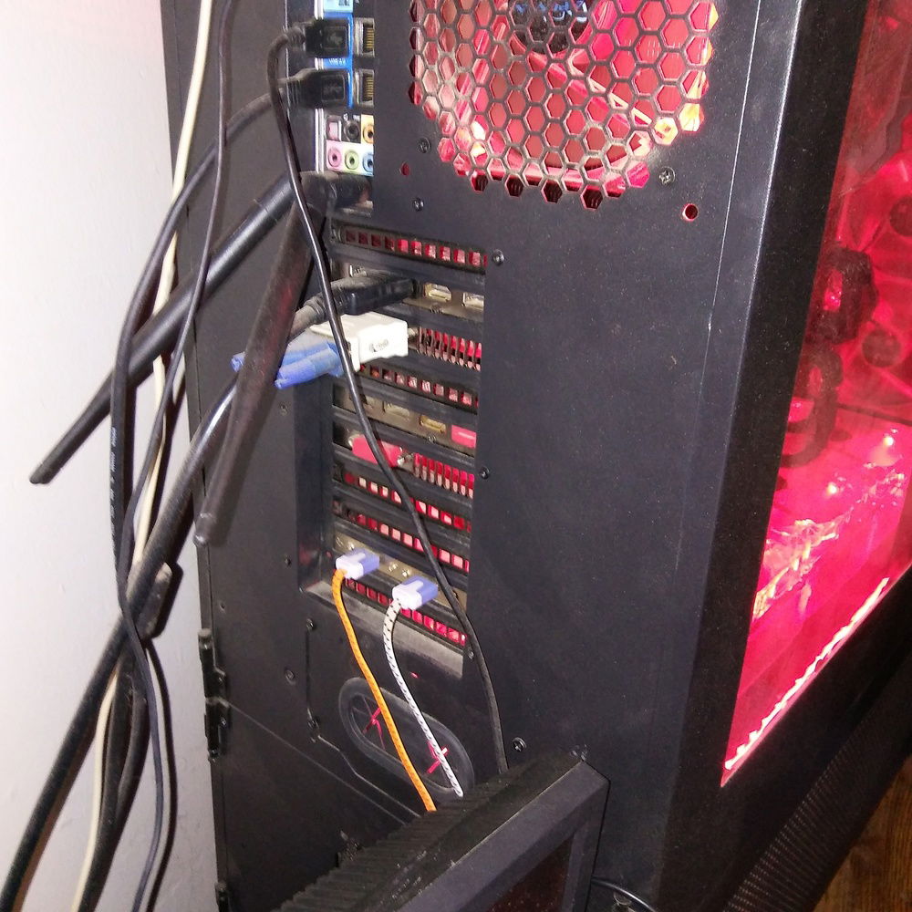 Here we can see the 10 expansion slots that not only allowed me to use a wider spacing on the GPU's, but still left room to add an additional USB 2.0 bracket, and could still accommodate more if I needed it....