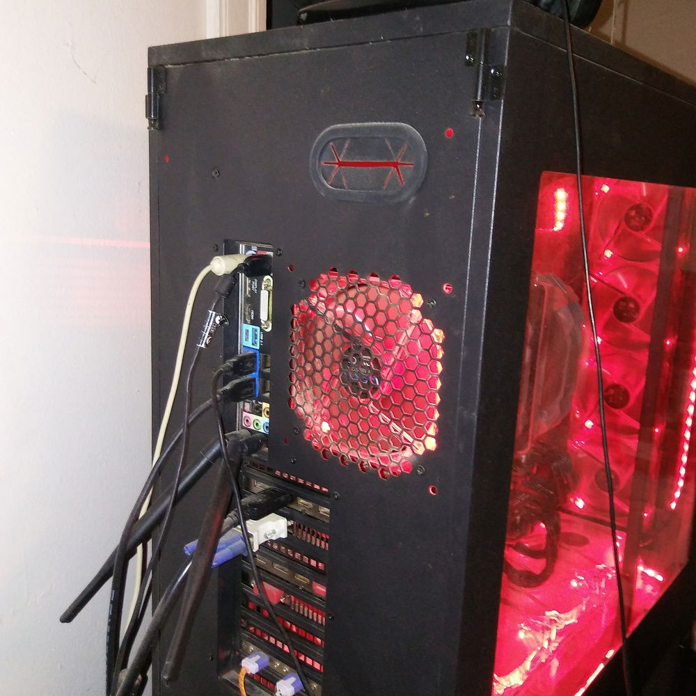 There's another cable passthrough at the top here at the back, so if you're going to use a P100 up there, you could use it to run watercooling tubes to radiators up there, or other cables perhaps.....All in all, it's a wonderful case to build in, and has lots of room for whatever you can imagine.