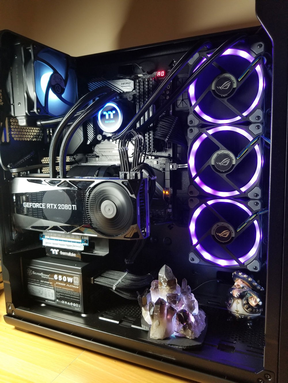 Card is here, used stock rear exhaust fan for a push pull setup on the hybrid cooler