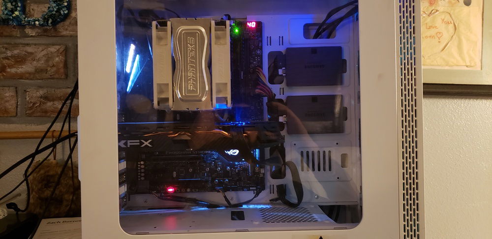 Basic build layout. Cable management has taken a backseat since the introduction of the graphics card. Haven't had the time to really organize it a little better.