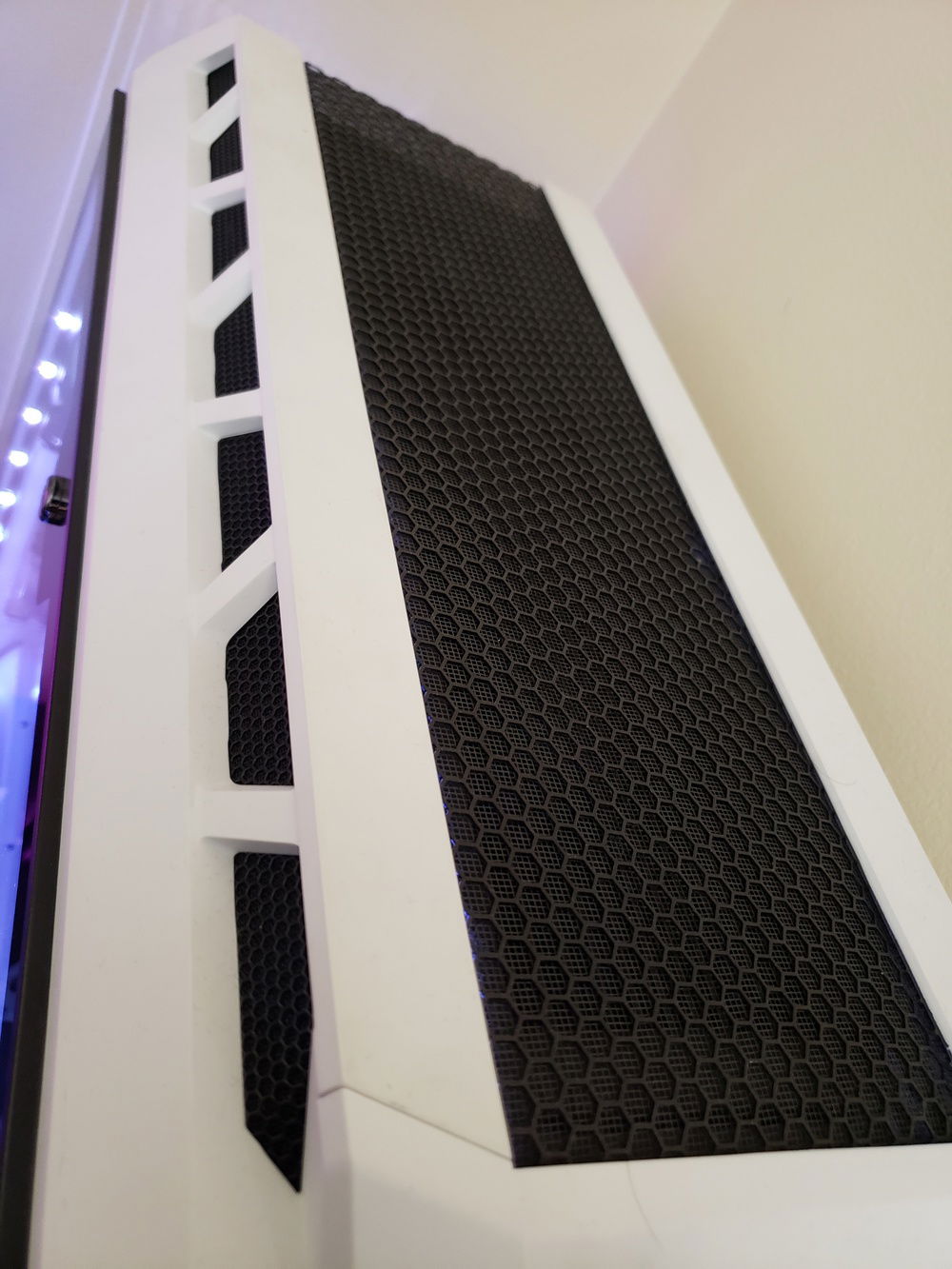 Plexiglass removed and replace with painted hex metal and dust filter installed into for better airflow.