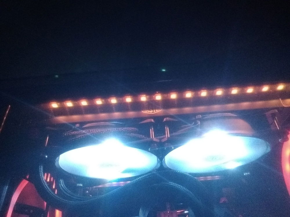 The light in the cooler fans look blue but it's actually white