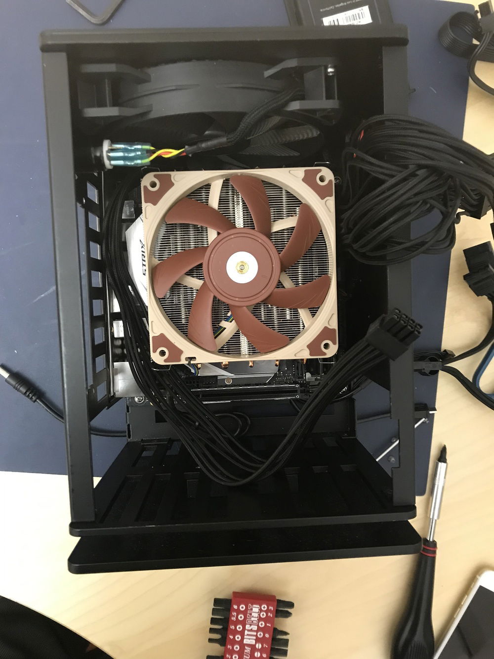 Shoehorned the motherboard in place