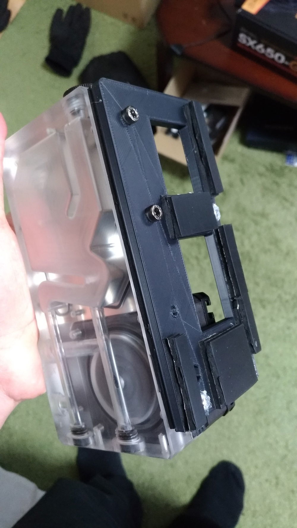 I stuck the rubber to bracket to prevent vibration noise.