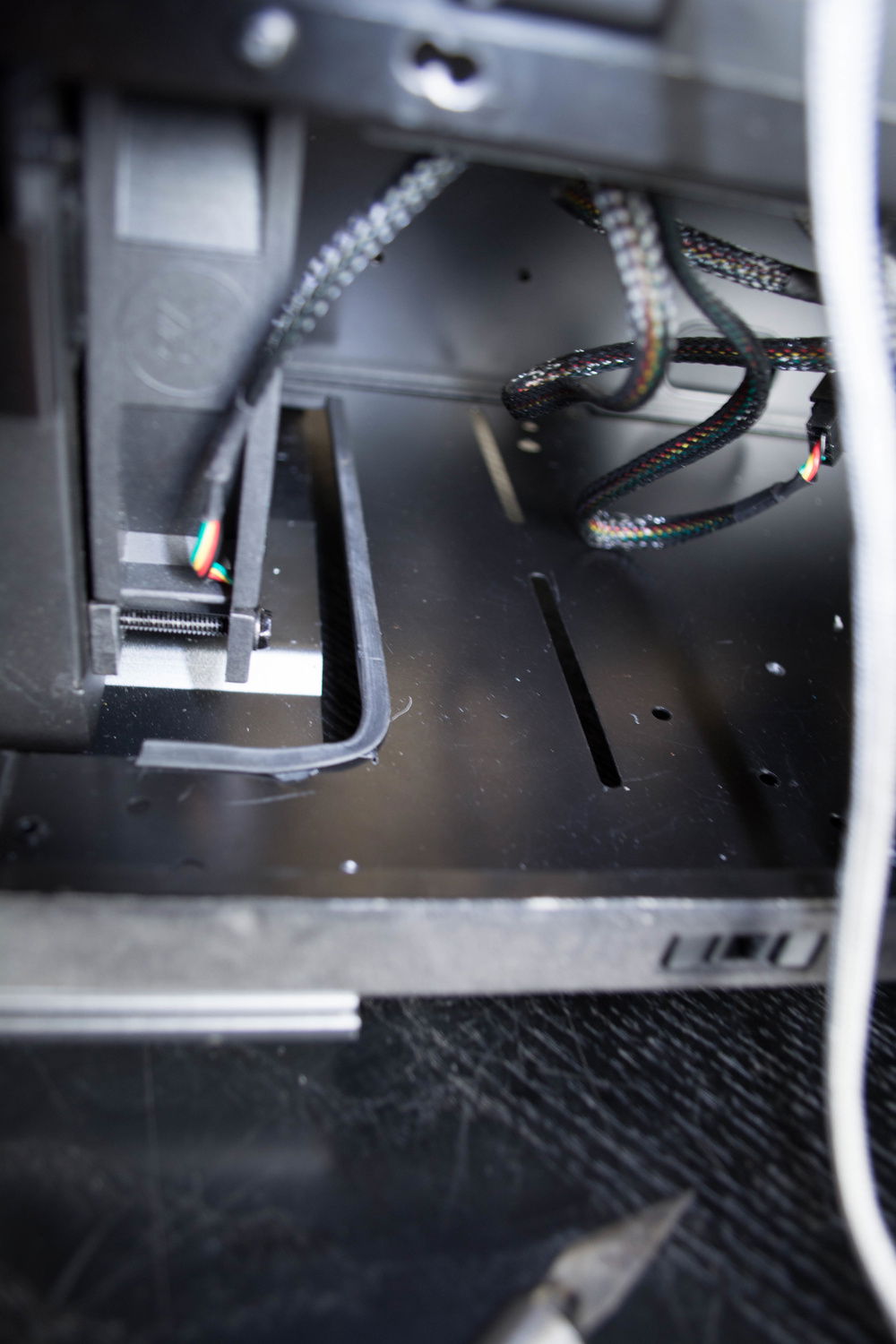 Bottom of front radiator inside. pump will be mounted here in Version 3.