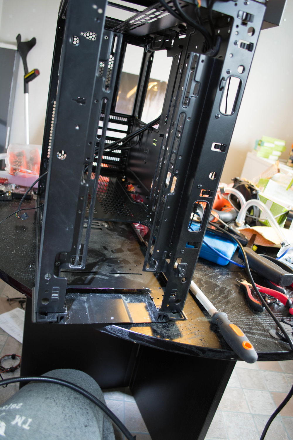 The front 360 radiators needed to be lower to not interfere with the top radiator.