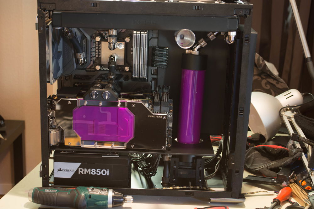 Leak testing. Front fans removed for drying after squirt from a radiator fitting.
The pci tabs stick down to psu so just used motherboard distances to push the psu back.(dont want to cut the PCI in case i want to use them in another chassi)