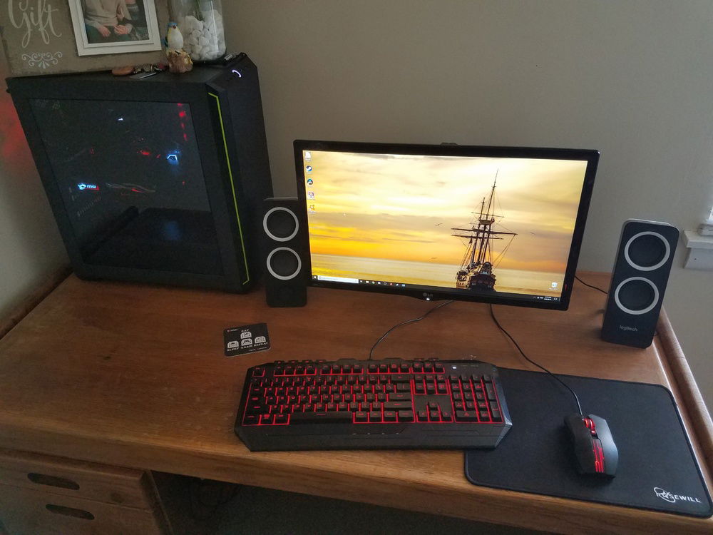 My whole pc setup. A new table is in the works, but I have this old one someone gave me for free in the meantime.