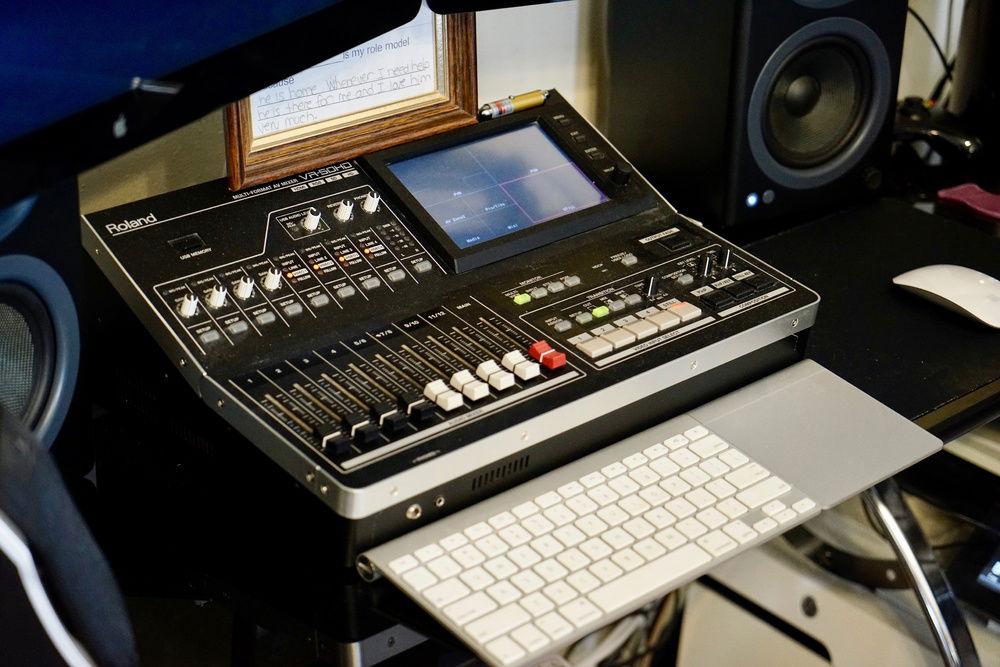 Roland VR-50HD Digital audo/video mixer, AudioEngine A5+ reference speakers.