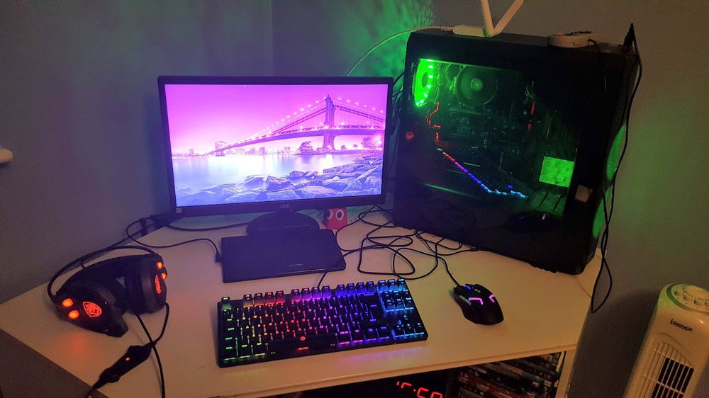 The build itself, the IA is on top of the case (along with a SNES controller), my headphones that have a fade effect. My keyboard, the most RGB part of the whole build, my mouse (ew), and my monitor. The back is where all the cables are but I haven't had enough problems to consider management.