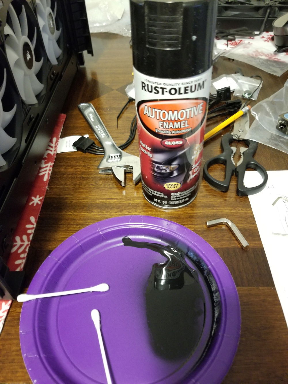 I used some Black Enamel paint to touch up the holes I drilled in the bottom of the case and in the top where I made new holes for the top rad.