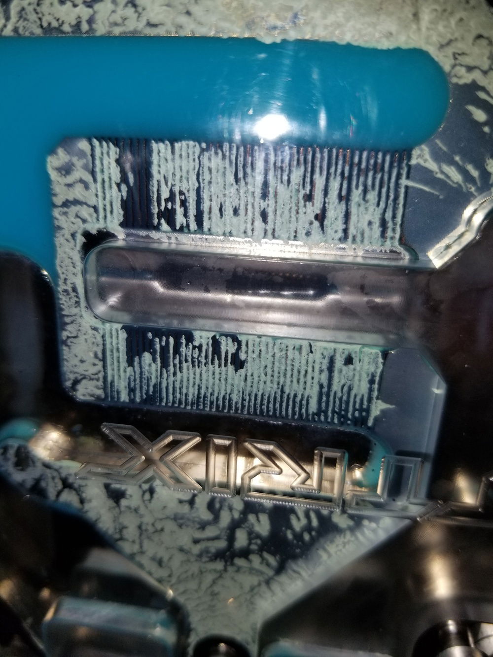 I did some quick googling and found this was an issue some others were having. Someone suggested pulling the straw from the fill bottle up away from the bottom so none of the chunks would get sucked up if they do get into the fill bottle. So I mixed my other bottle of concentrate to give myself plenty of fluid to work with and kept the straw pulled away from the bottom and topped off my 205mm res which was only half full from the first bottle. However after a very short time while waiting for the small air pockets throughout the system to work their way out I checked and the gpu had gotten completely gummed up and looked horrible. I realized that theres just a bunch of the smaller stuff suspended in the fluid which is still too big to make it through the loop and the big chucks that settle wernt the only issue.