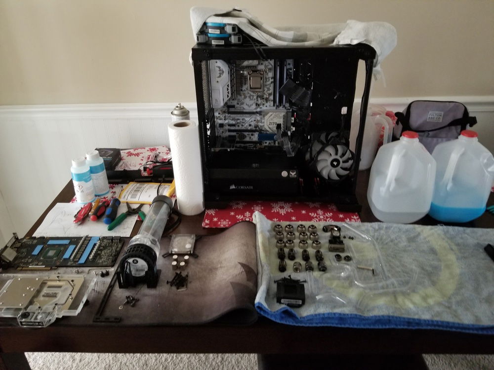 I completely flushed then tore apart and cleaned my entire loop including the blocks and the radiators. And after a few days was able to get an RMA in the works with EK. My dining room tabled sat like this for a week and a few days while I waited.