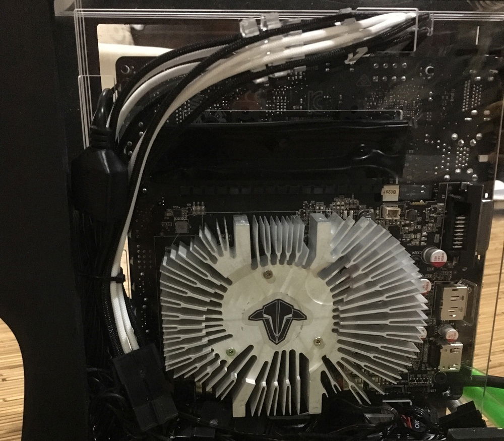 Stock gpu cover and fan removed. Cooling via id cooling 120mm.