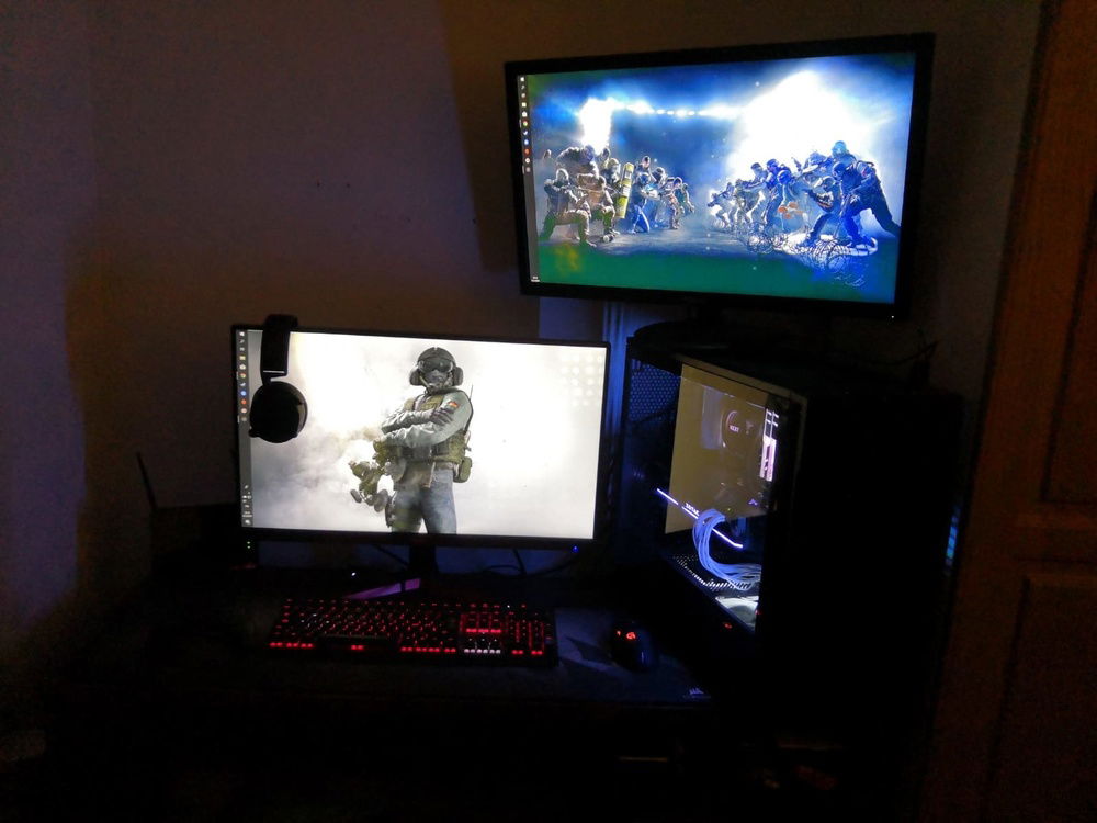 The screen on top of the PC will most likely be wallmounted. Maybe a 24" screen will come above the PC itself in the future.