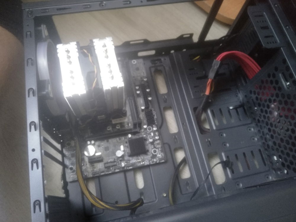 Plonking the motherboard in.