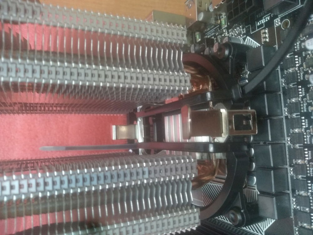 Ziptie'ing the cooler on