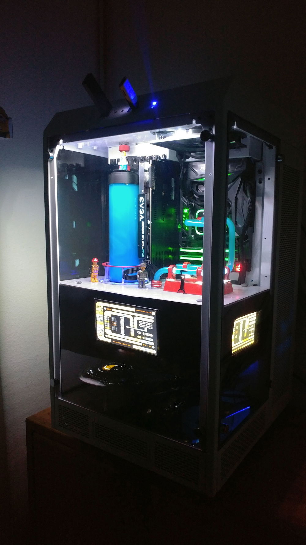 3 layer tower. PC on top, rasp pi in the center, and custom illuminated model in the bottom
