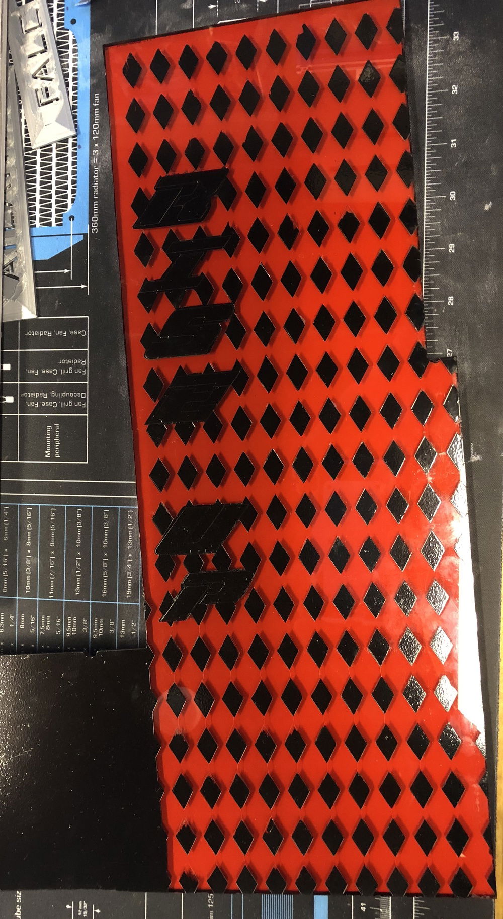 Back side painted red and stencil removed from front removed