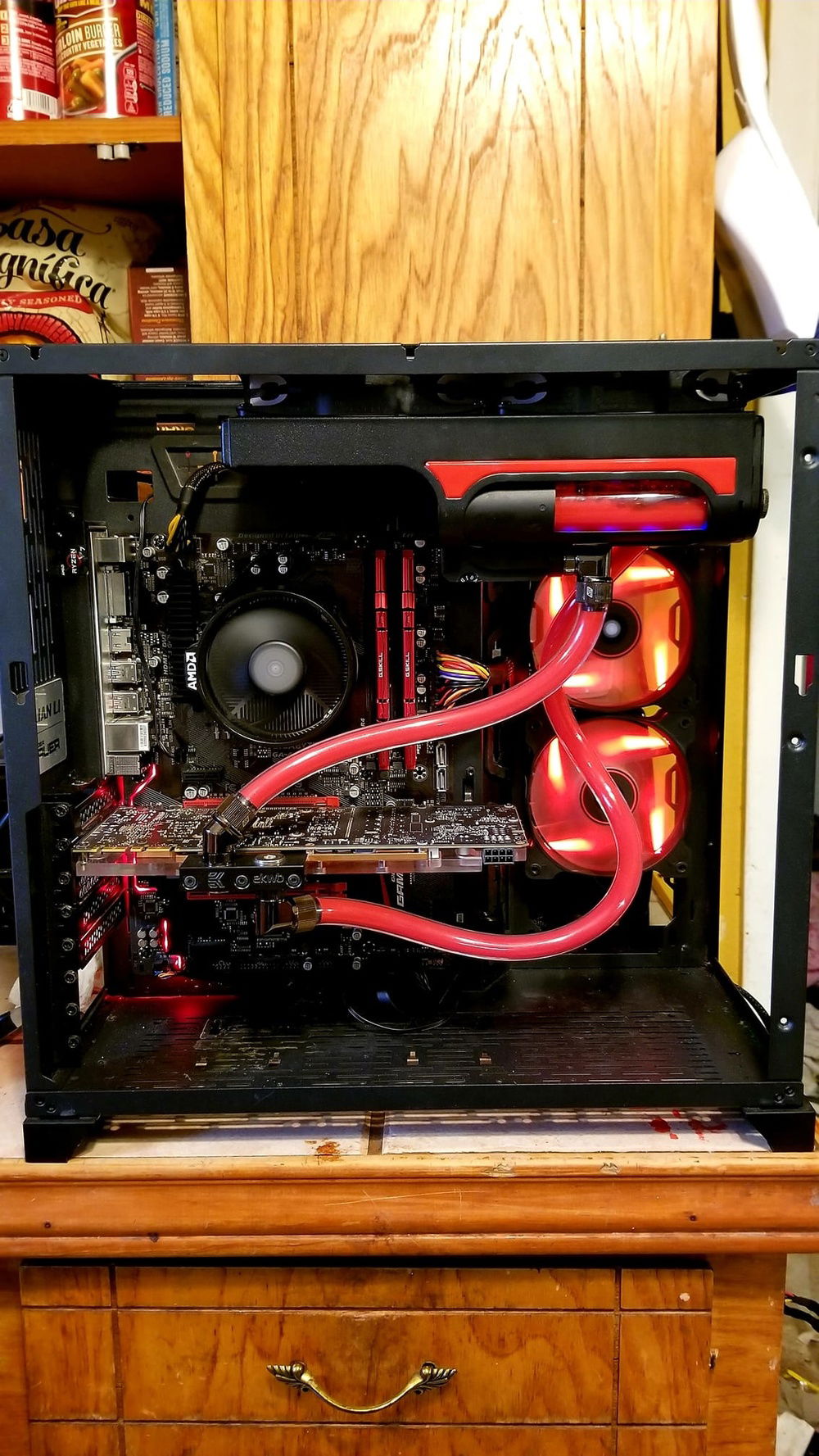 the stock cooler does plenty for the 1300x so i opted only to cool the 1080 FE with liquid on a swiftech 240 pump/rad/ res combo system and with that full cover copper EK block it does wonder in the most demanding games...now she can game to her hearts content without worry of overheating...big bro slides in for the win! lol