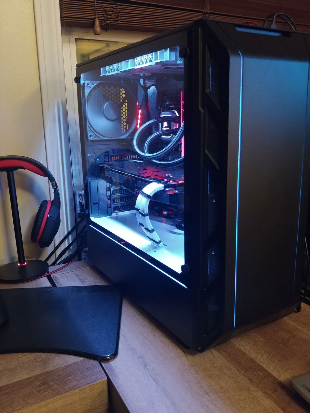 Phanteks P350 with diffused lighting strips in the front and below the PSU shroud.