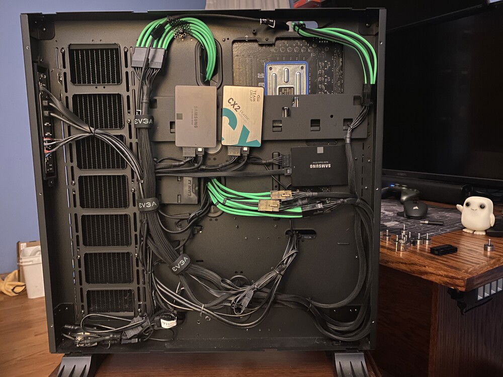 Scott’s Velcro is your friend. It claims to hold 10 pounds so it definitely can hold a hard drive