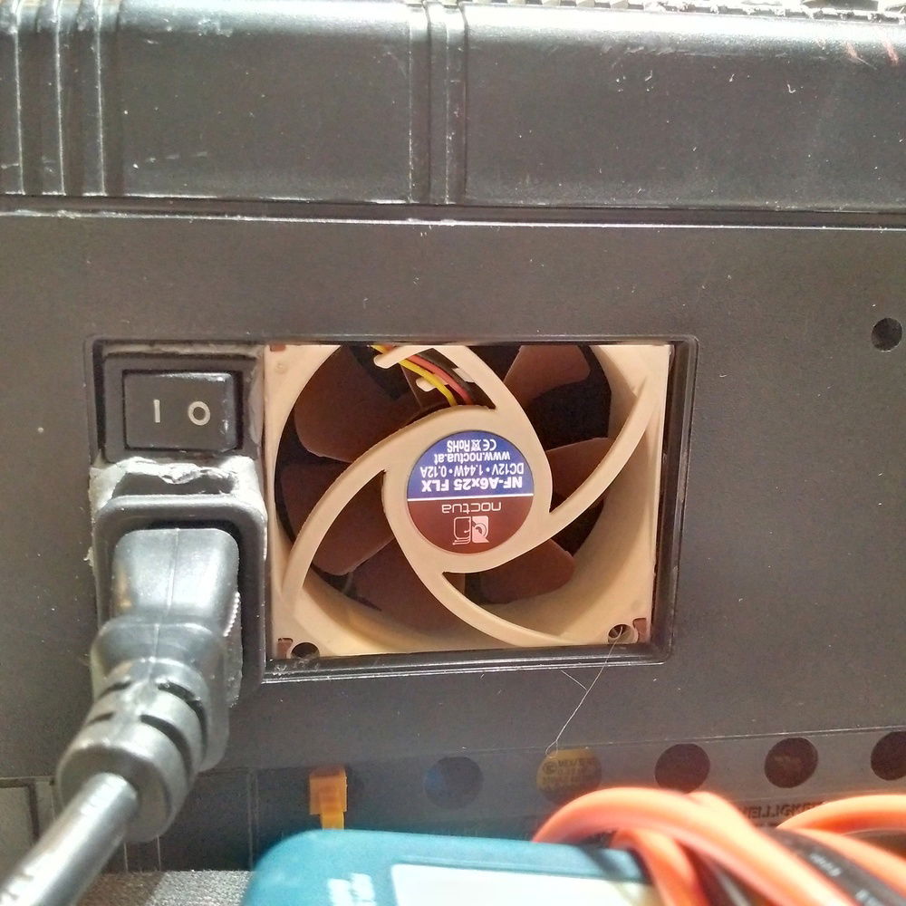 Smaller 60mm Noctua to get some airflow over the oscilloscope PSU, in case it is switched on without the computer running.
