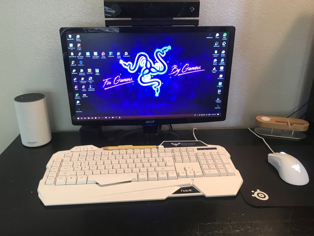 The Kinect is mounted to the monitor with off-brand GoPro mounts and double-sided tape