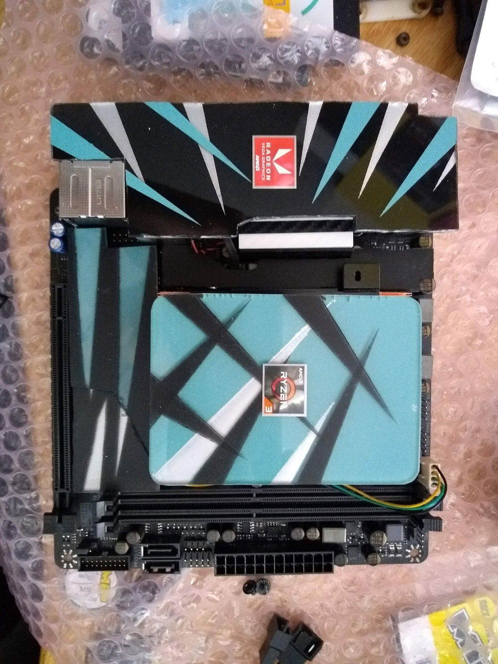 The motherboard and CPU cooler