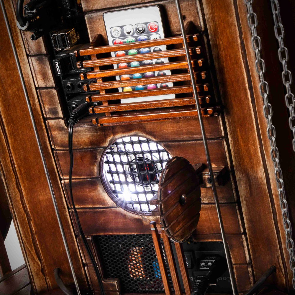 here you can see the iron forged look mech covering the fans and the swing out fan cover which blows open when the fans are on full power. the mech was made of drain pipe leaf filters
