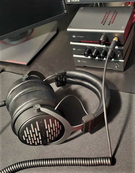 My Beyerdynamic DT 1990 Pro headphones, swapped the stock pads to Dekoni Elite Hybrid. Have the headphones hooked up to a Schiit stack, which consists of a Magni Heresy amp, Loki M+ EQ, and Modi 3 DAC.