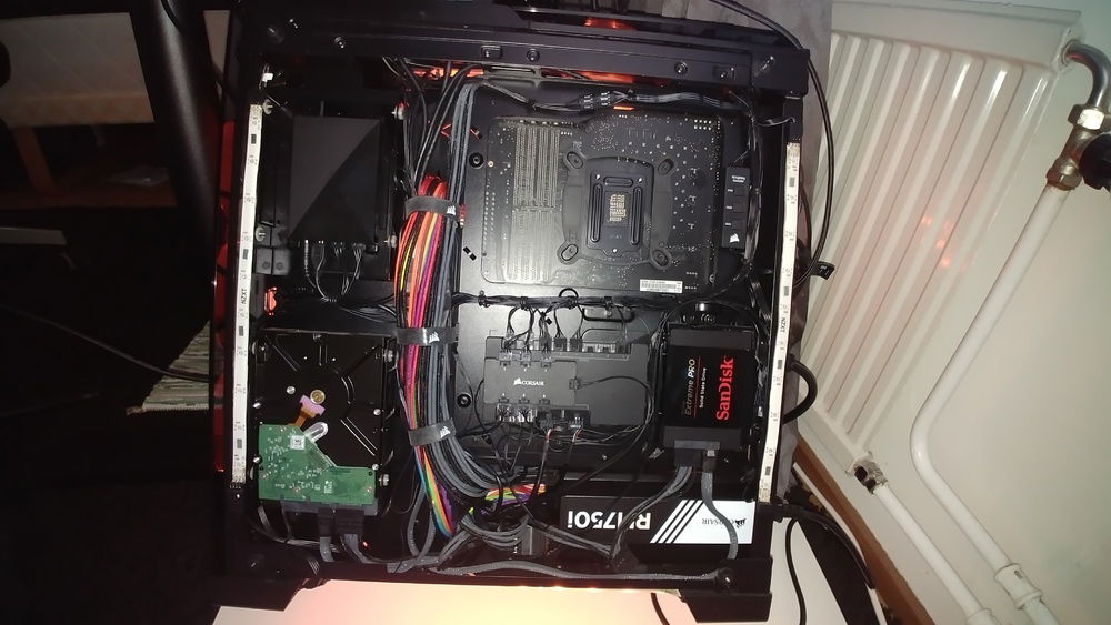 Cable management post-sleeved cables. That big bunch of cables running down the middle is so fat I can barely fit the glass side-panel on.