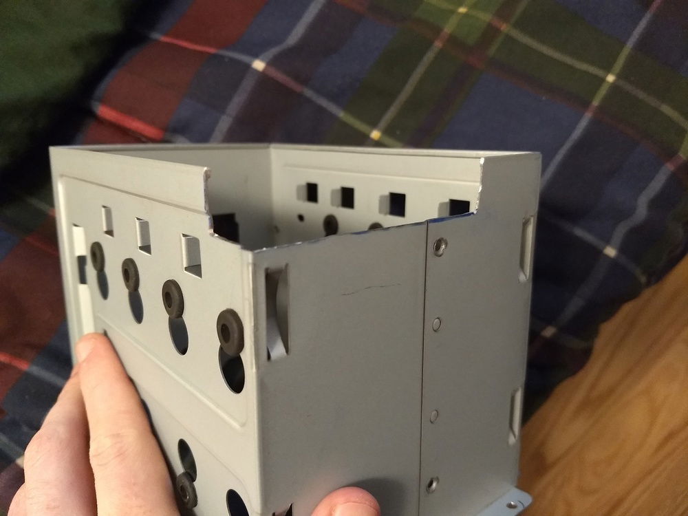 Had to cut out a piece of the hard drive cage to fit the gtx 960 (260 mm card!) in the 1st slot.