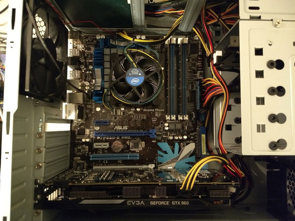 It wouldn't be a stock cooling showdown without a stock cooler! The system more or less as it was pulled from the dump.