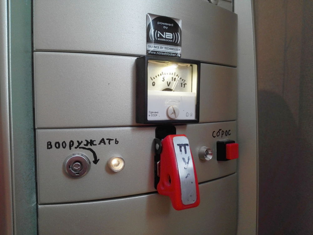 The voltage gauge was originally for 50 V DC with no lighting, so I had to mod that too. And yes, it's freehand labeling. Never got around to do this properly.