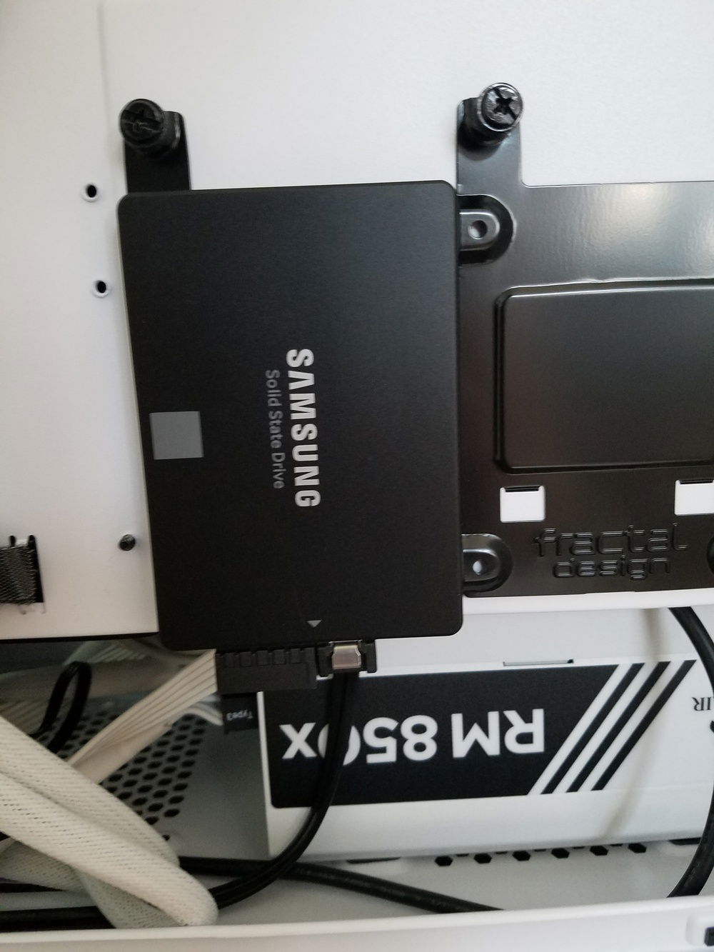 Samsung 860 EVO 1TB secondary storage drive.

The PSU is a Corsair RM850x White, 850 Watt, 80+ Gold Certified, Fully Modular Power Supply