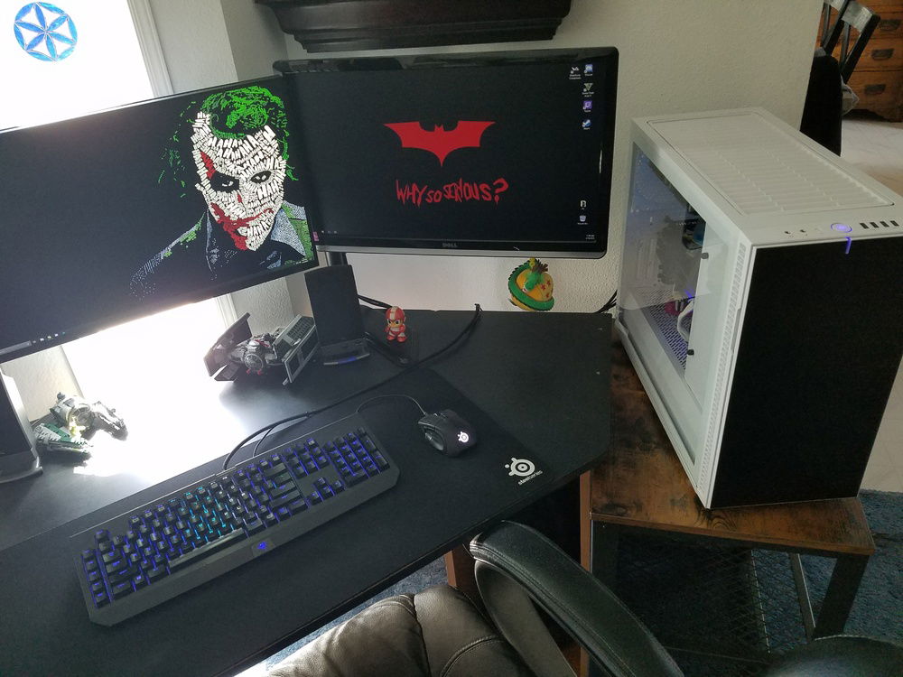 The Dell S-Series 27-inch with up to 155mhz refresh rate, and a 1ms response time, and the 24-inch secondary Dell monitor are mounted to the WALI Free Standing dual LCD monitor mount. Fully Mechanical Razer Blackwidow Chroma Stealth, and a Steel Series Rival 500 mouse are sitting on top of a SteelSeries QcK Gaming Surface - XXL Thick Cloth