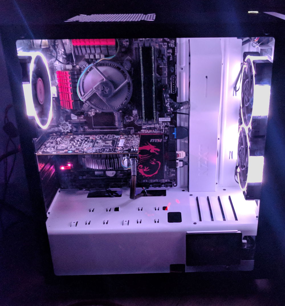 This is the first version. I didn't like the red accent, the generic ram and stock CPU cooler.