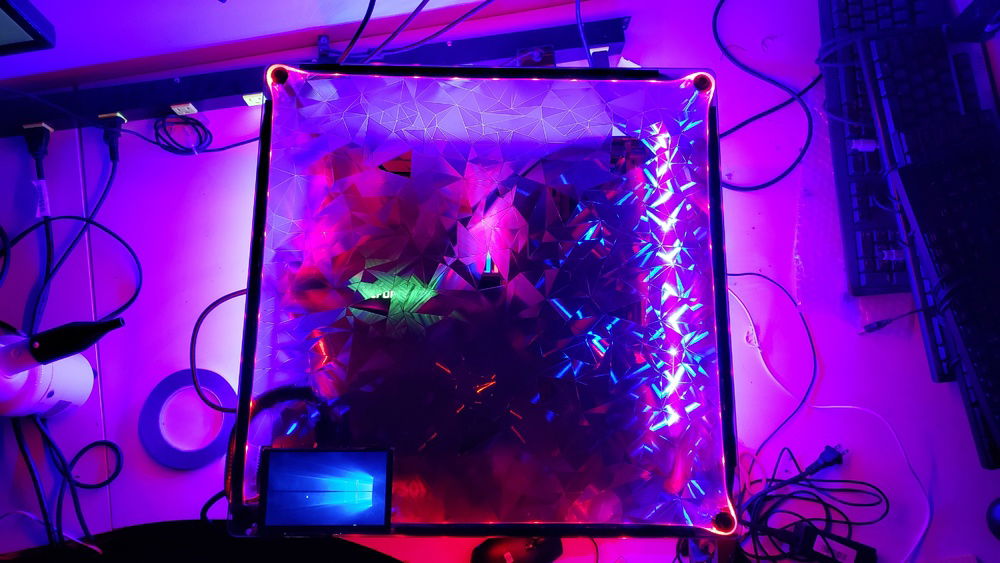 Window vinyl creating the fractal design works will with the LEDs on the inside of the glass combined with a cutout for the stat screen