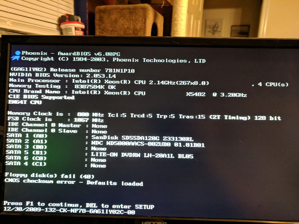 Computer posting, recognizing the xeon, until I get the new cooler the bios is proably as far as I can go, it's sitting in bios at 76c (toasty)