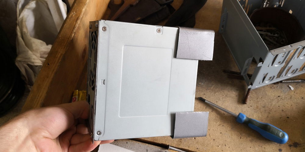 Tabs on bottom will support the rear end of the PSU.