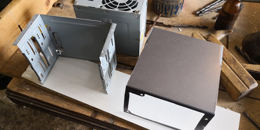 Here together with the modified 5.25" bay for pump.